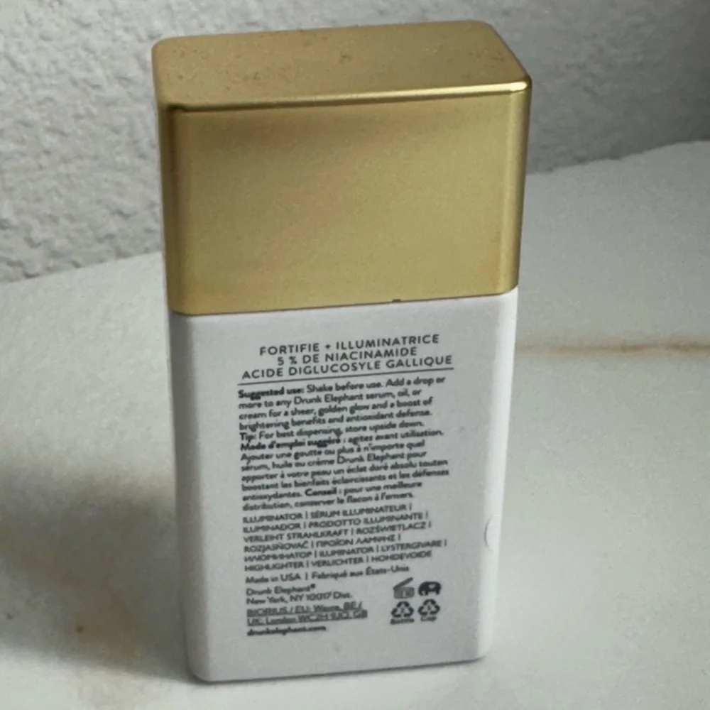 Drunk Elephant Gold and White Skincare Elixir